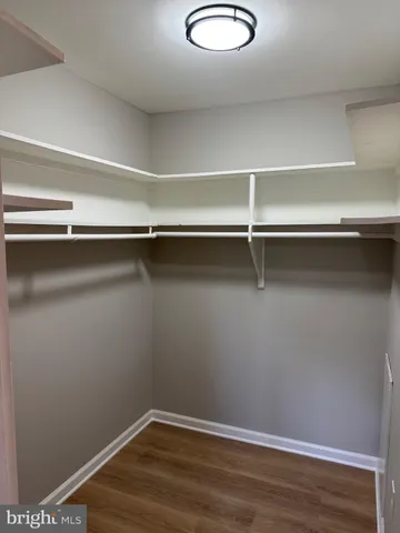 a view of a room with racks on the wall