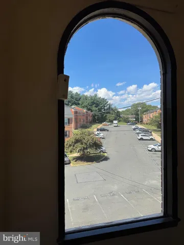 a view of balcony and yard