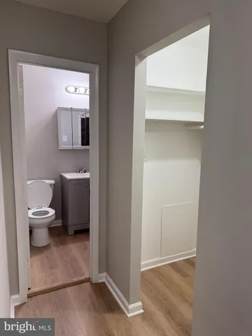 a bathroom with a toilet sink