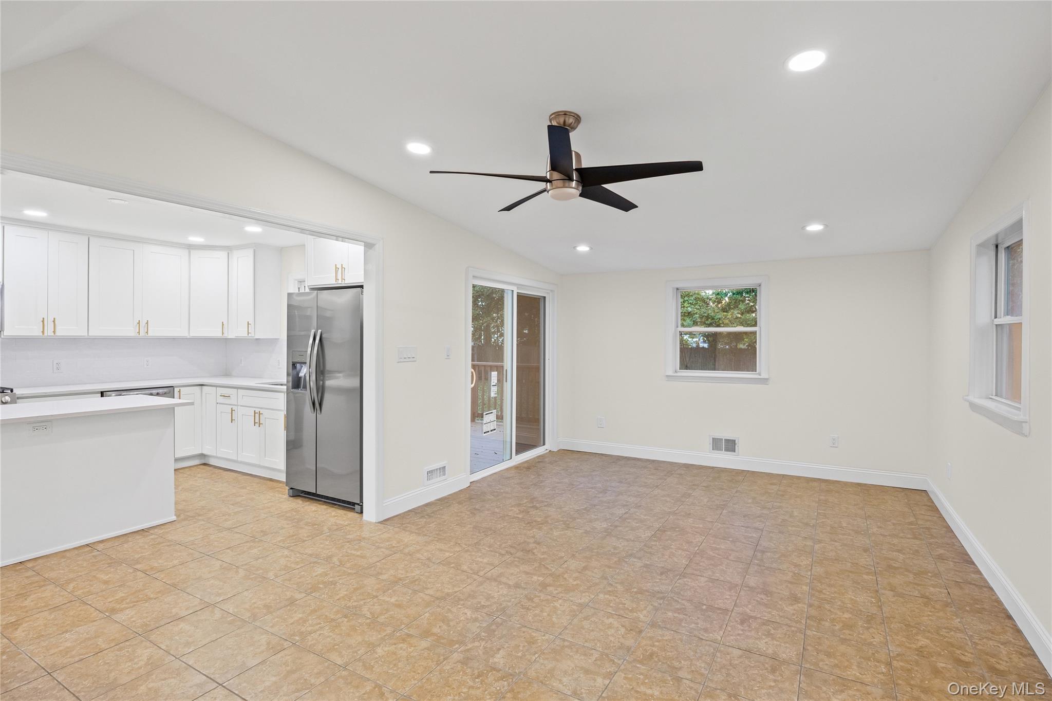 31 Colony Road Port Jefferson Station, NY 11776 - Photo 17 of 32 a view of an empty room with window and cabinet