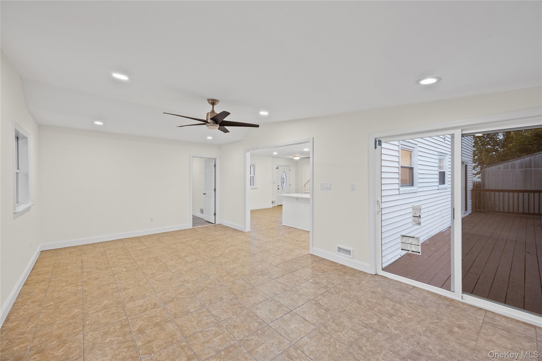 31 Colony Road Port Jefferson Station, NY 11776 - Photo 18 of 32 an empty room with windows and cabinet