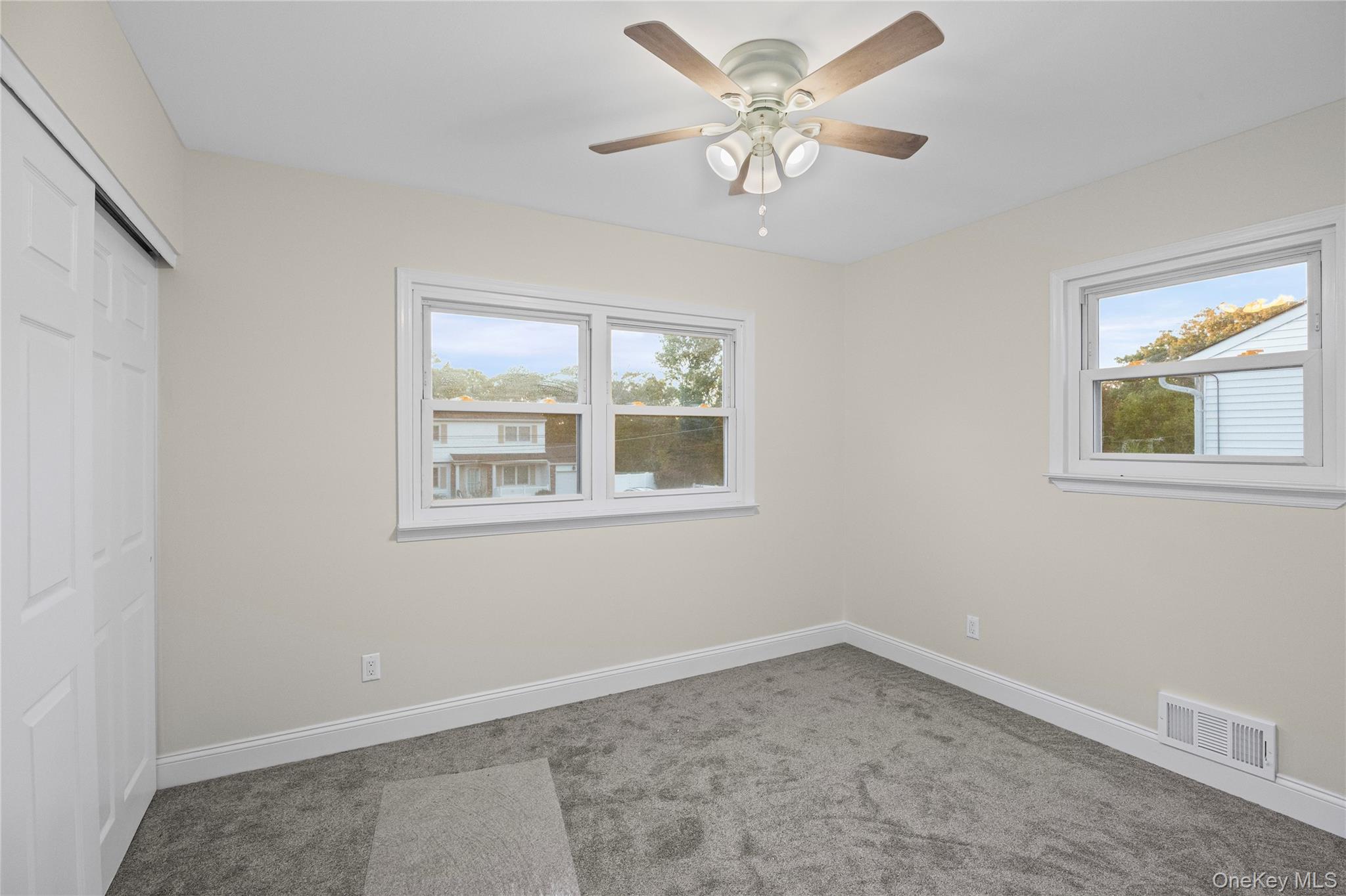 31 Colony Road Port Jefferson Station, NY 11776 - Photo 20 of 32 an empty room with a window
