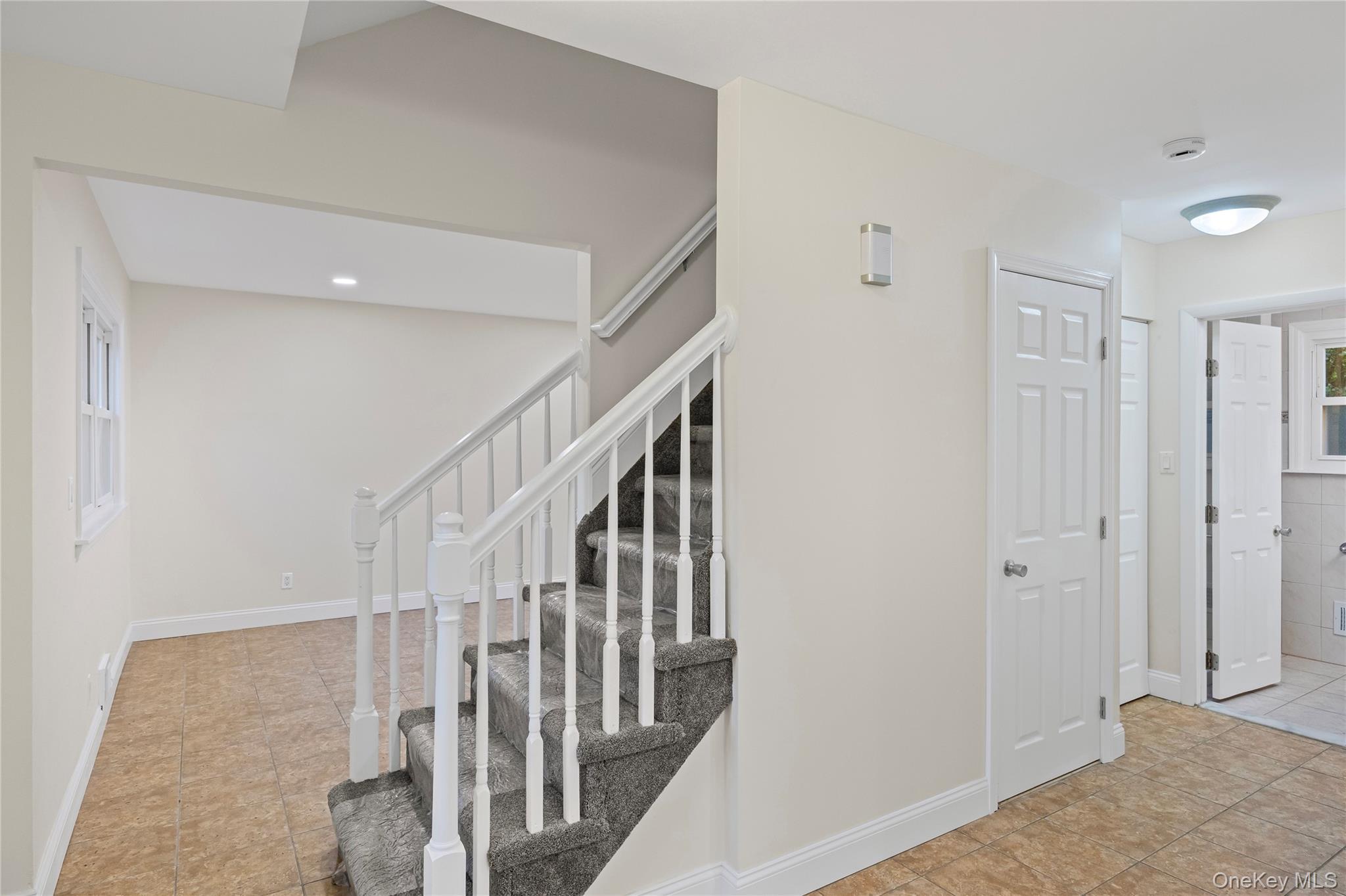 31 Colony Road Port Jefferson Station, NY 11776 - Photo 3 of 32 a view of a hallway with staircase