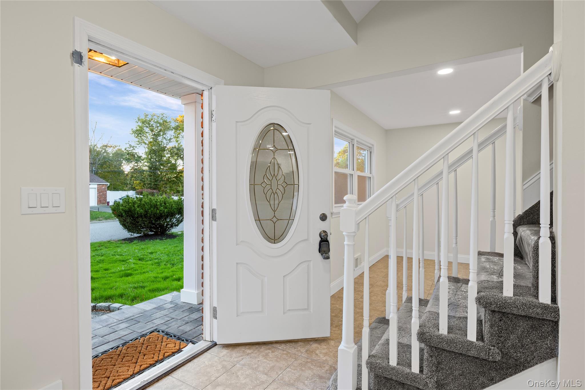 31 Colony Road Port Jefferson Station, NY 11776 - Photo 4 of 32 a view of a house with a backyard