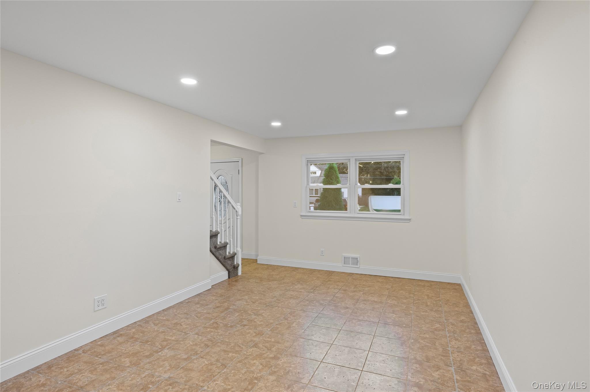 31 Colony Road Port Jefferson Station, NY 11776 - Photo 6 of 32 a view of an empty room