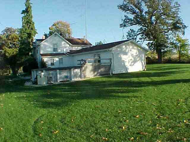 1382 North Rees Road Pearl City, IL 61062 - Photo 2 of 5 a front view of a house with garden