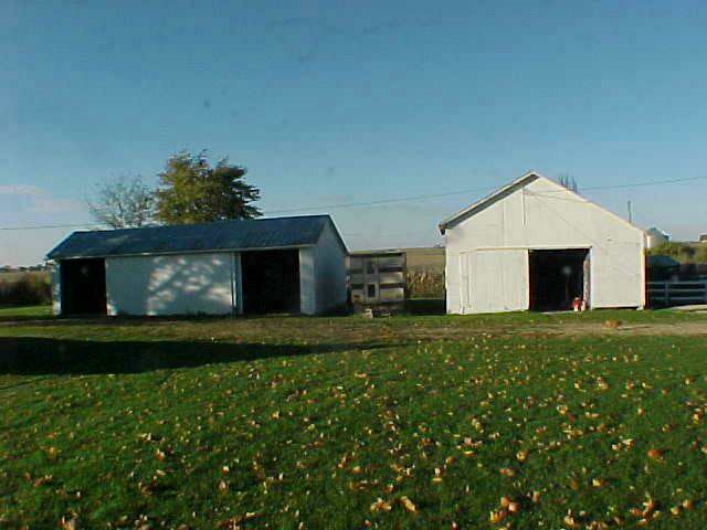 1382 North Rees Road Pearl City, IL 61062 - Photo 4 of 5 a front view of a house with a garden