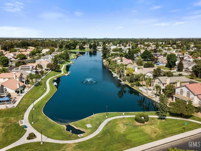 an aerial view of a house with outdoor space
