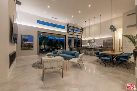 a outdoor living space with furniture and a garden