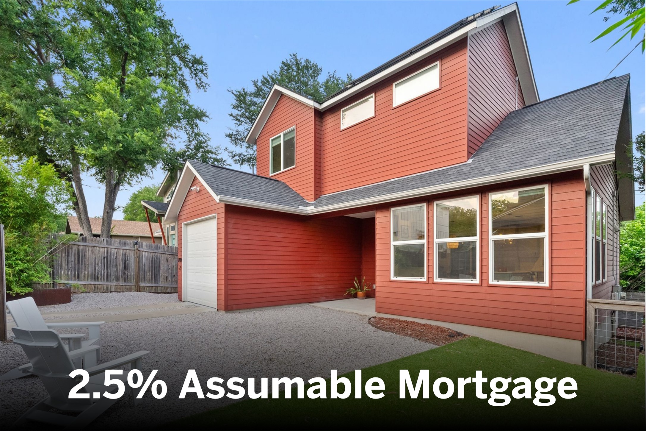 Bold red siding distinguishes this unique home with an integrated garage and ample windows.