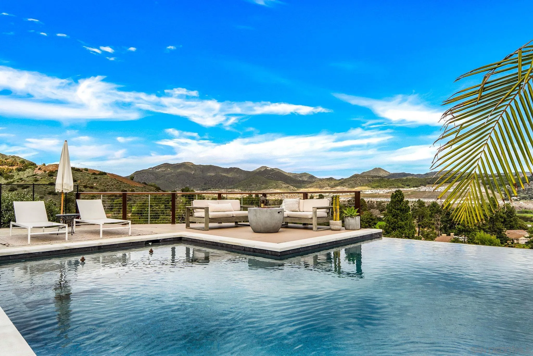 2836 Mesa Grove Road Fallbrook, CA 92028 - Photo 20 of 46 a terrace with outdoor seating and city view