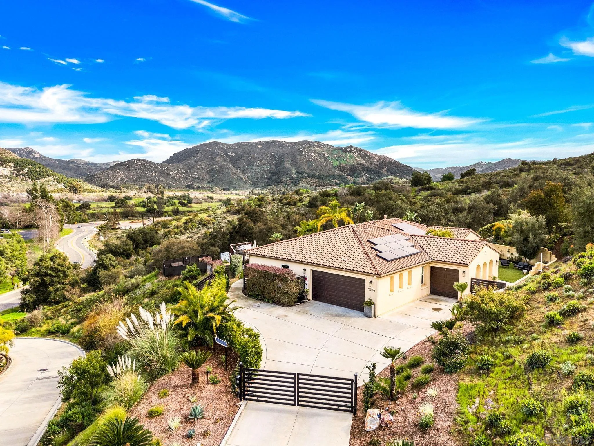 2836 Mesa Grove Road Fallbrook, CA 92028 - Photo 3 of 46 a view of a city with mountain