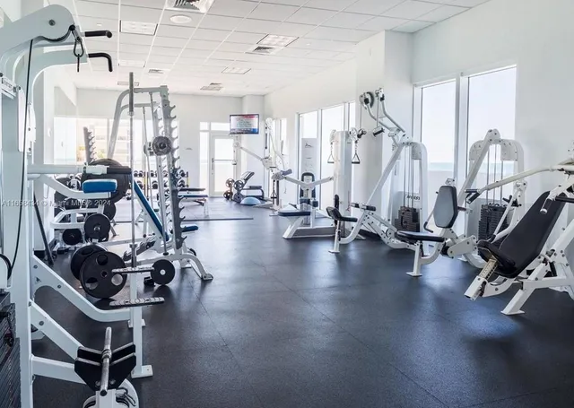 a view of balcony with furniture