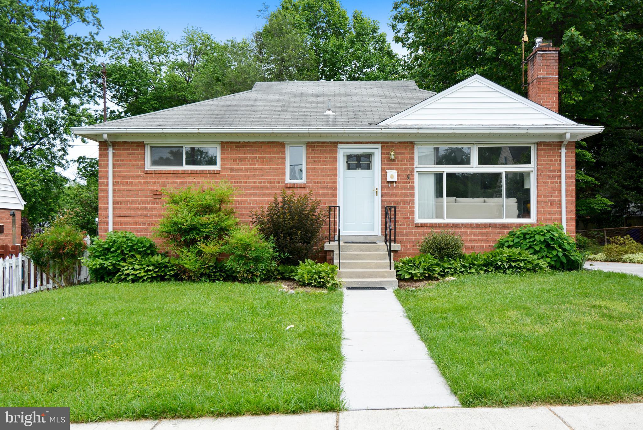 12719 Feldon Street Silver Spring, MD 20906 - Photo 1 of 30 a view of a house with a yard plants and large tree