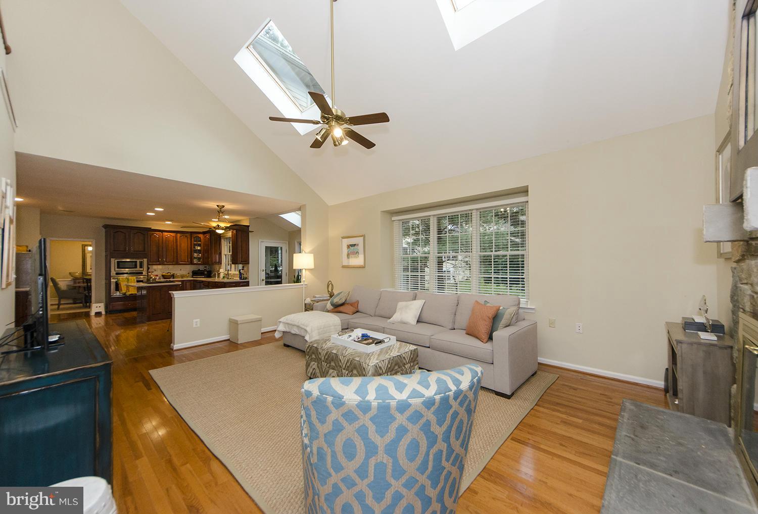 10871 Hunter Gate Way Reston, VA 20194 - Photo 2 of 30 a living room with furniture and a large window