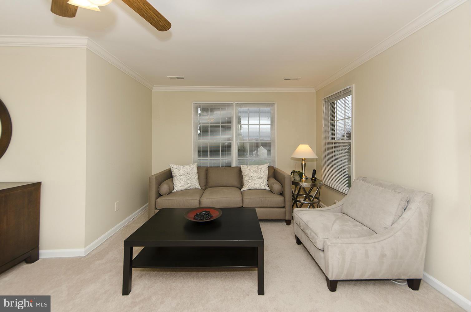 10871 Hunter Gate Way Reston, VA 20194 - Photo 14 of 30 a living room with furniture