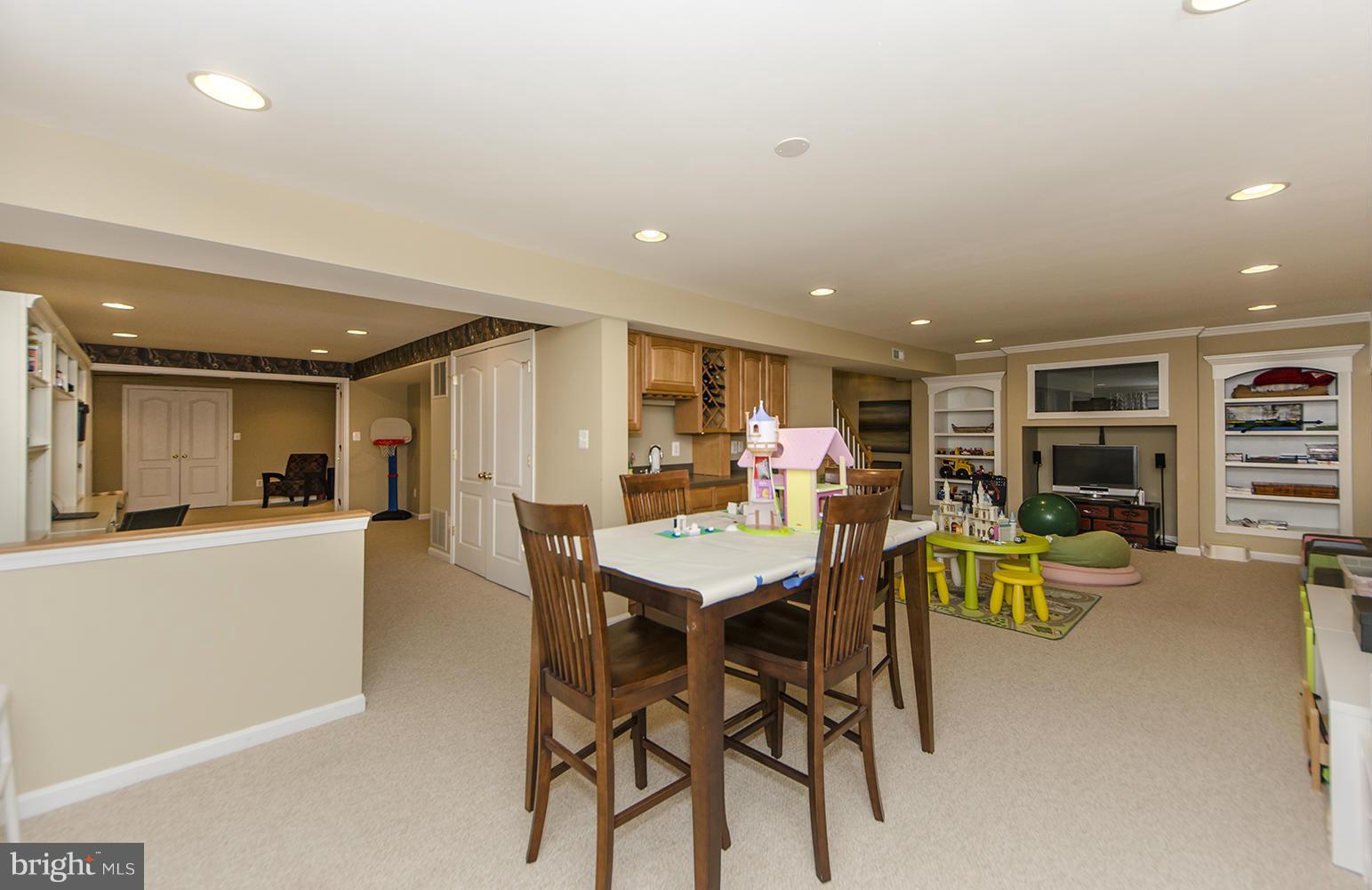 10871 Hunter Gate Way Reston, VA 20194 - Photo 22 of 30 a view of a dining room with furniture