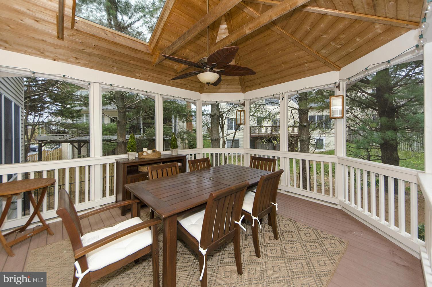 10871 Hunter Gate Way Reston, VA 20194 - Photo 28 of 30 a view of a patio with a table chairs and a table