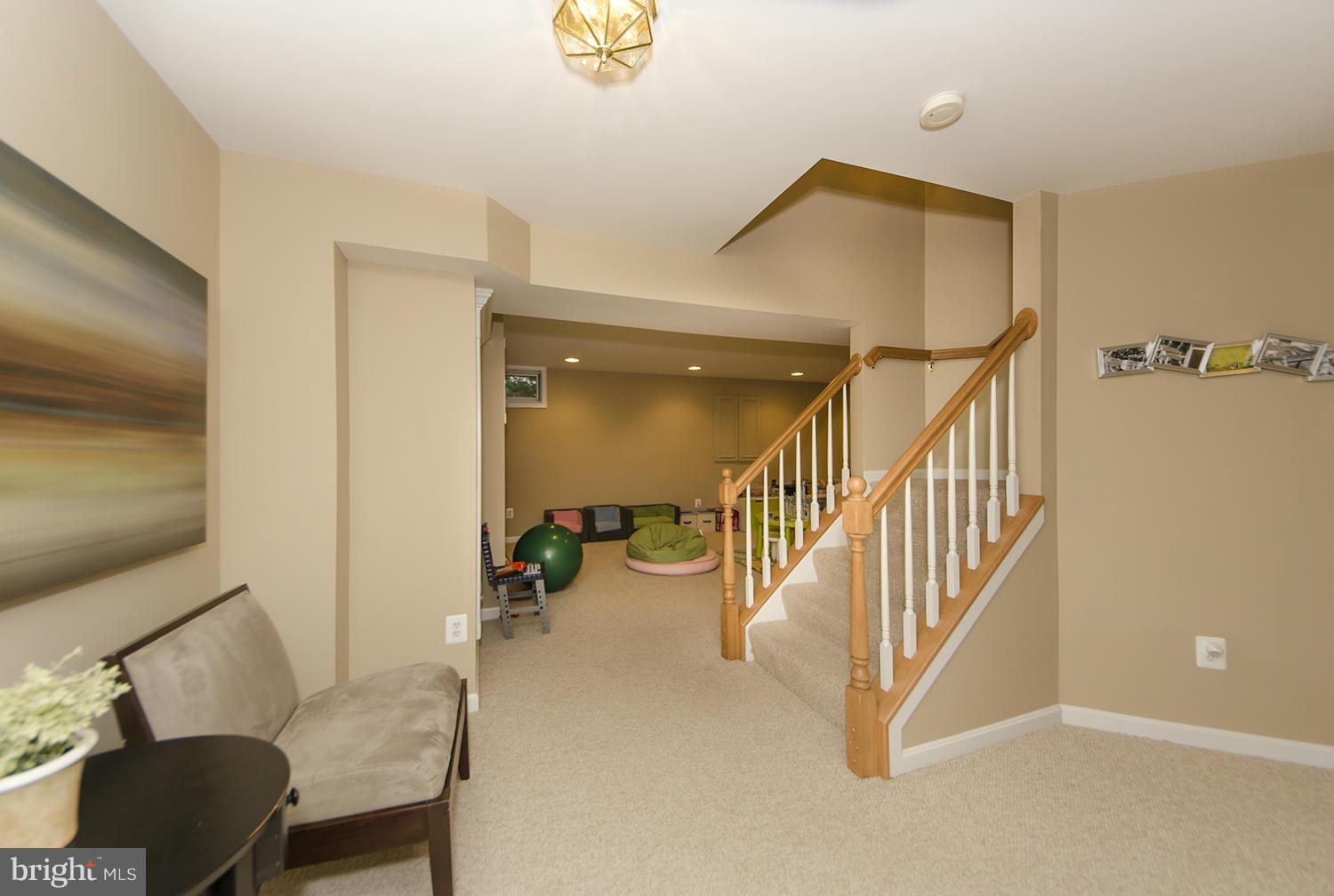10871 Hunter Gate Way Reston, VA 20194 - Photo 5 of 30 a view of a livingroom with furniture and staircase
