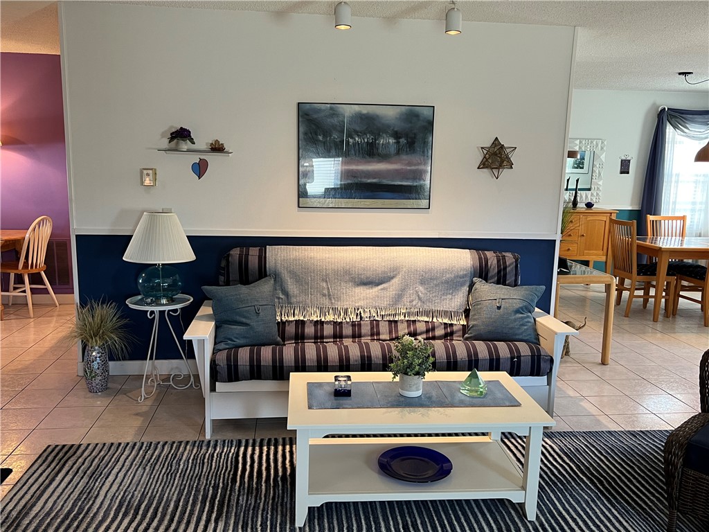 6 Captains Drive Westerly, RI 02891 - Photo 17 of 40 To the left of Living Room currently used as an office. Could be the Dining area or family room...