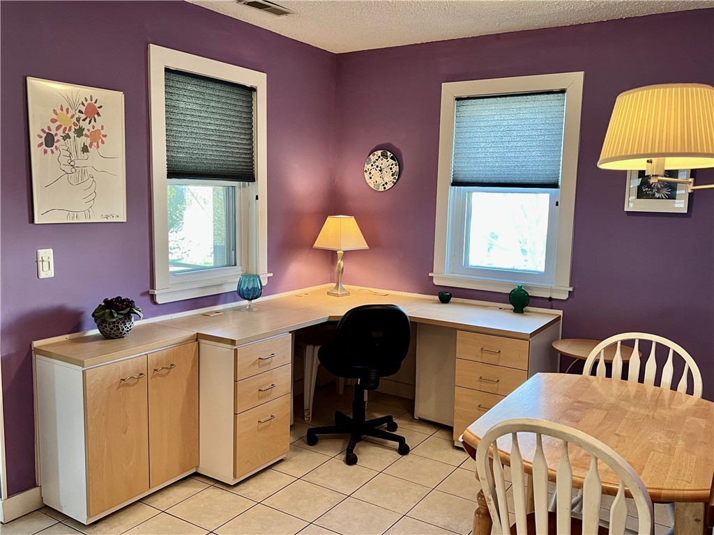 6 Captains Drive Westerly, RI 02891 - Photo 22 of 40 Currently used as office space off of kitchen. Could be utilized as formal dining area or family area.