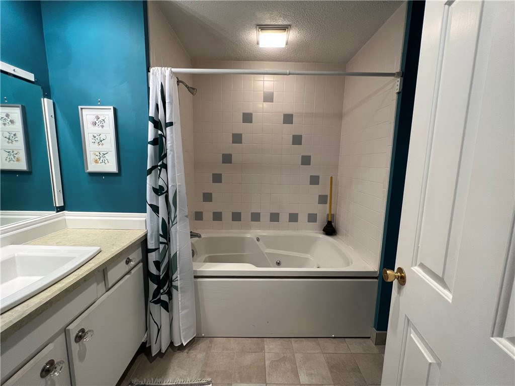 6 Captains Drive Westerly, RI 02891 - Photo 34 of 40 Primary bath has jacuzzi tub...and shower.