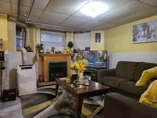 a bedroom with a bed and cabinets