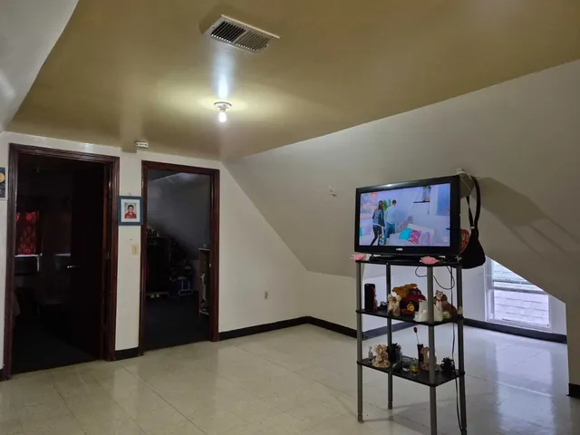 a view of room with gym equipment