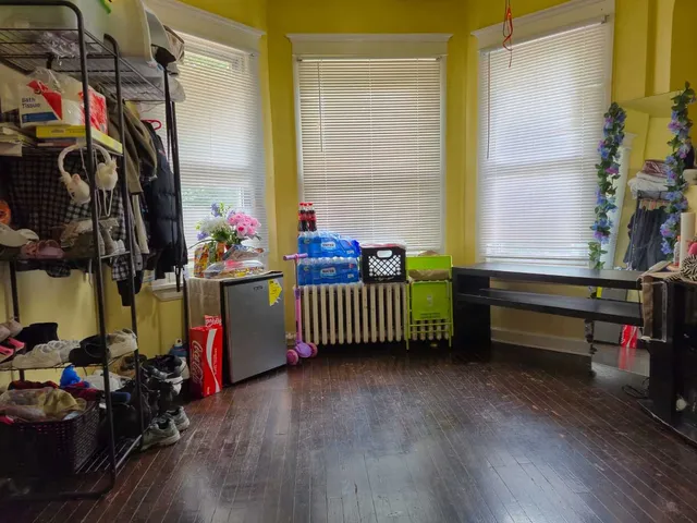 a room with furniture and a wooden floor