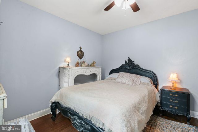 a bedroom with a bed and a closet