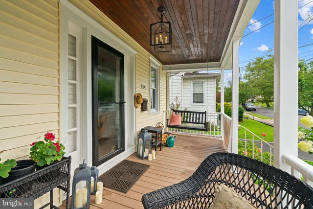a view of a porch with furniture