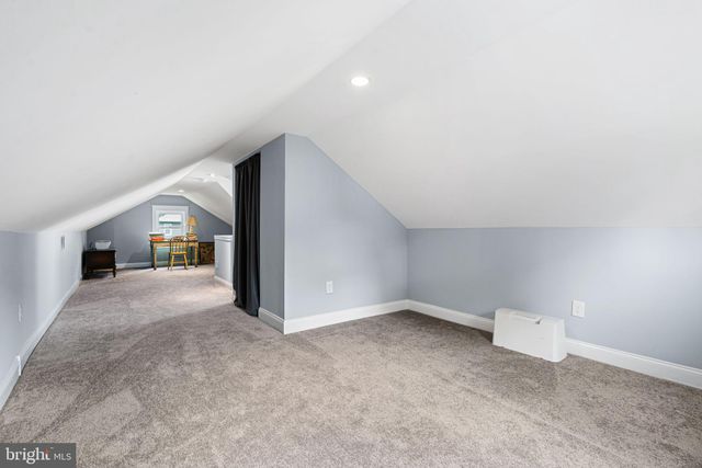 a view of swimming pool with a table and chairs