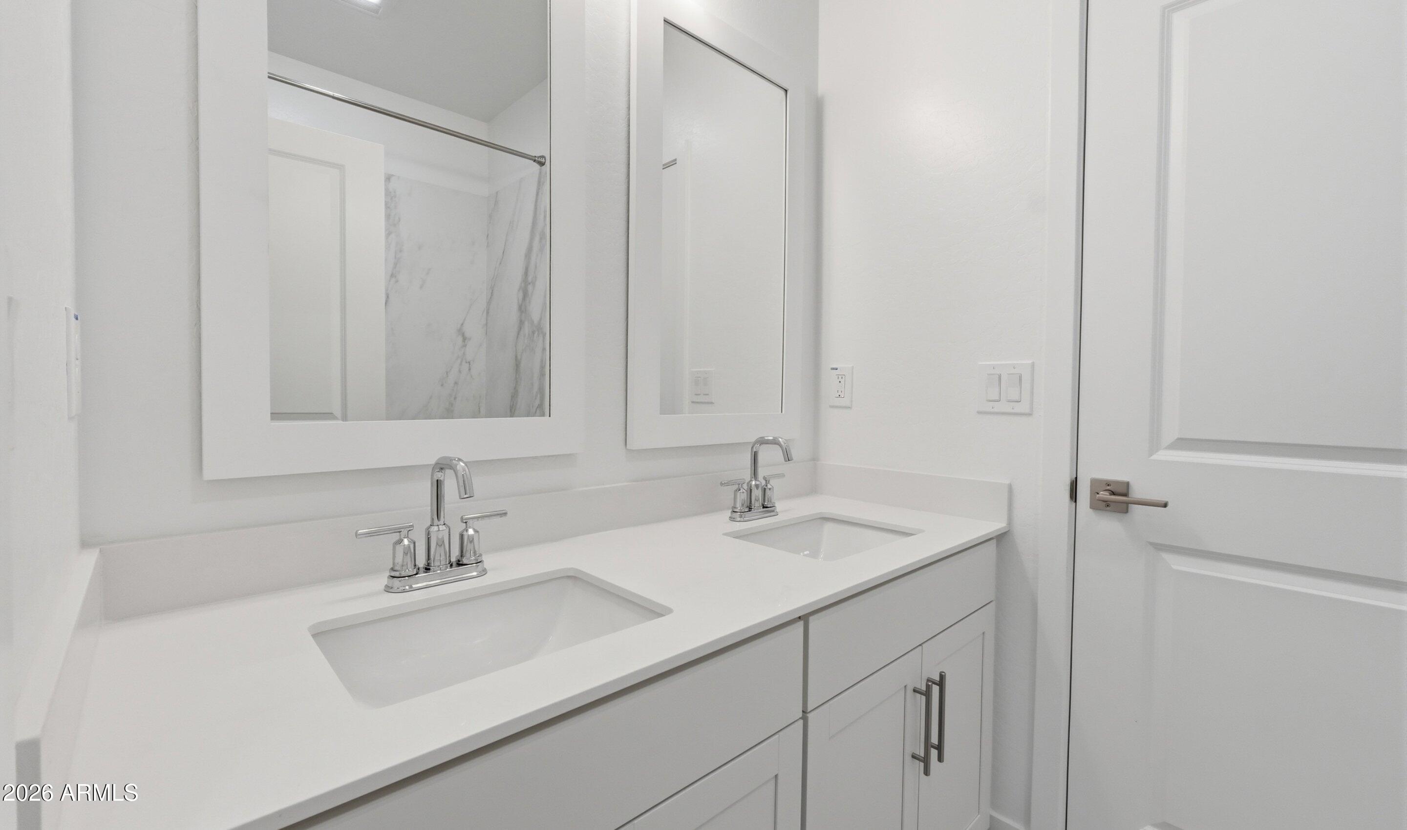 7779 West Sands Road Glendale, AZ 85303 - Photo 17 of 37 a bathroom with a sink and a mirror