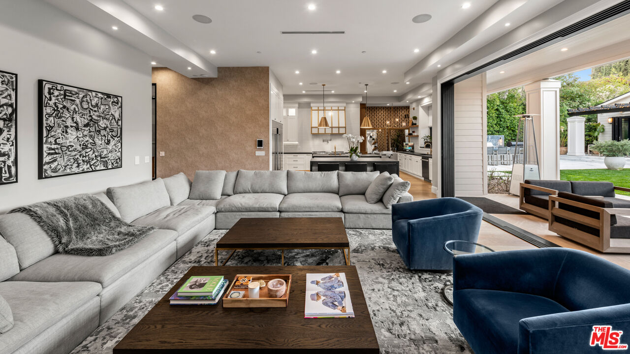 4421 Haskell Avenue Encino, CA 91436 - Photo 14 of 40 a living room with furniture and a large window