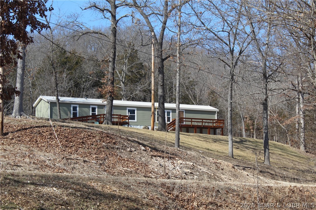 31674 Aspen Road Stover, MO 65078 - Photo 27 of 58 Home is sitting on a hill overlooking the lake