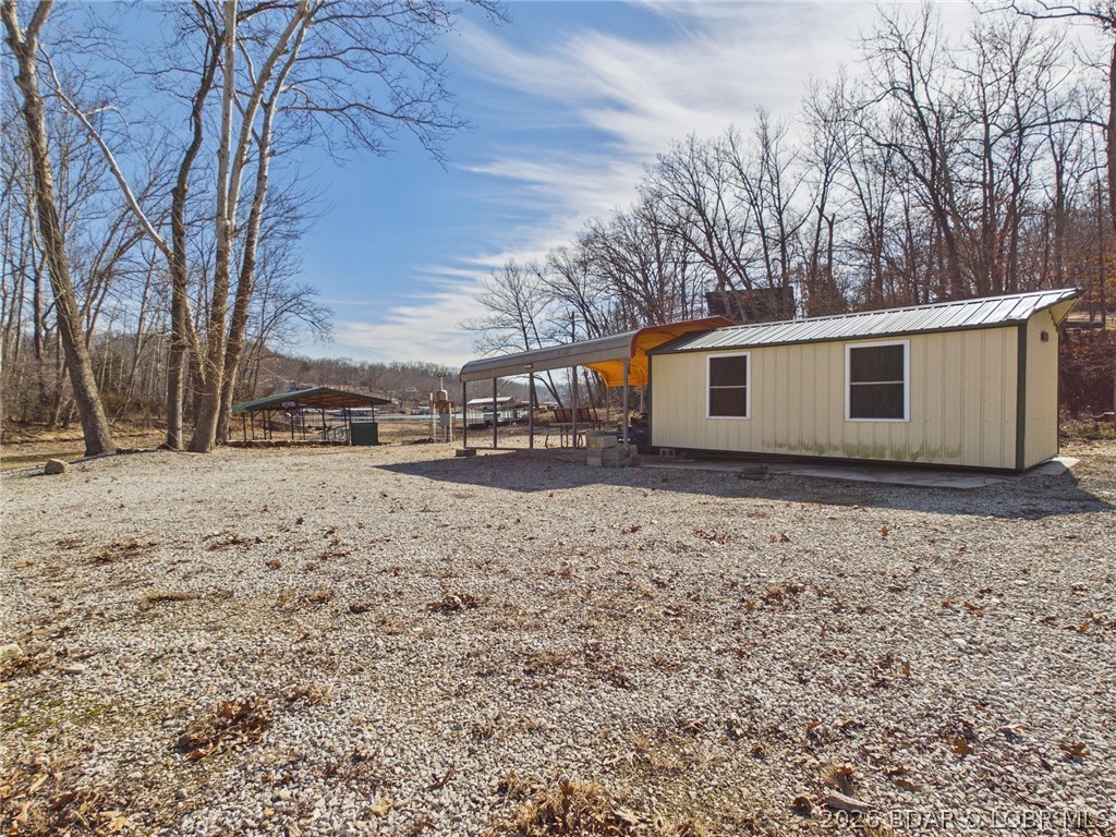 31674 Aspen Road Stover, MO 65078 - Photo 34 of 58 Insulated Carport and shed dockside
