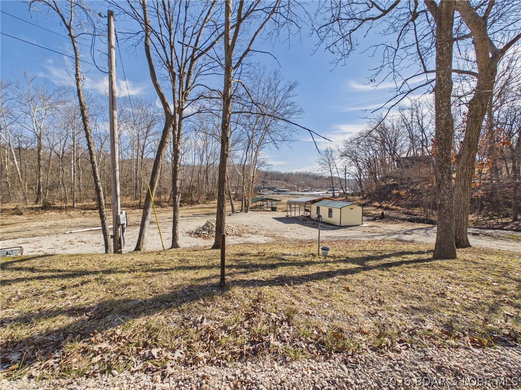 31674 Aspen Road Stover, MO 65078 - Photo 37 of 58 2 RV hook ups, insulated shed and carport and dock