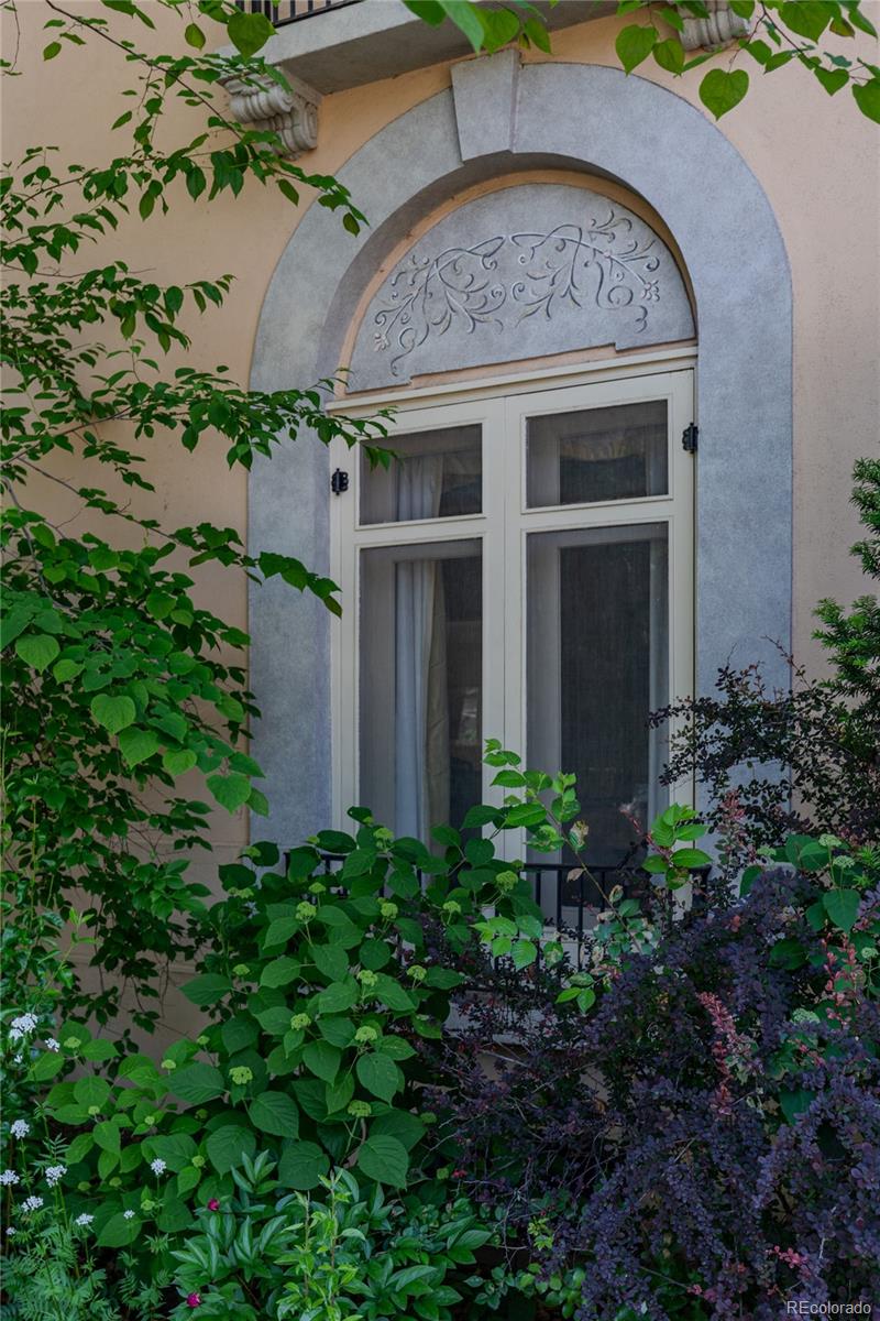 199 Lafayette Street Denver, CO 80218 - Photo 3 of 49 a view of a house with potted plants