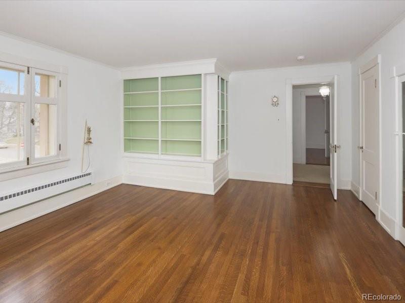 199 Lafayette Street Denver, CO 80218 - Photo 32 of 49 wooden floor in an empty room with a window