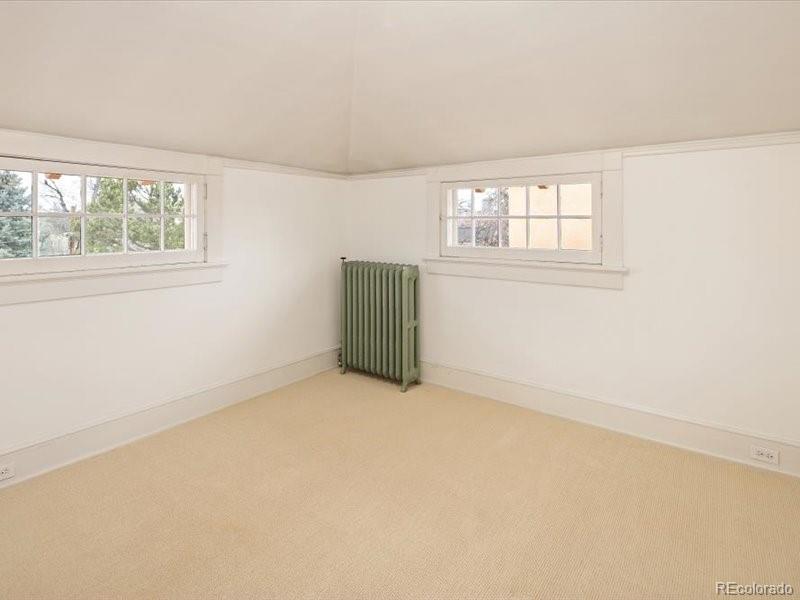 199 Lafayette Street Denver, CO 80218 - Photo 33 of 49 an empty room with windows