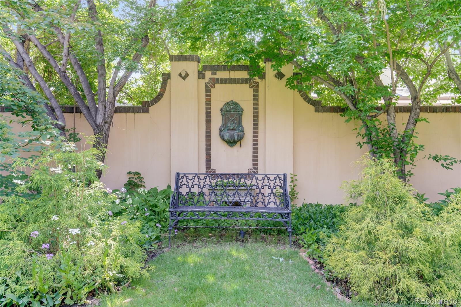 199 Lafayette Street Denver, CO 80218 - Photo 40 of 49 a garden with trees in the background
