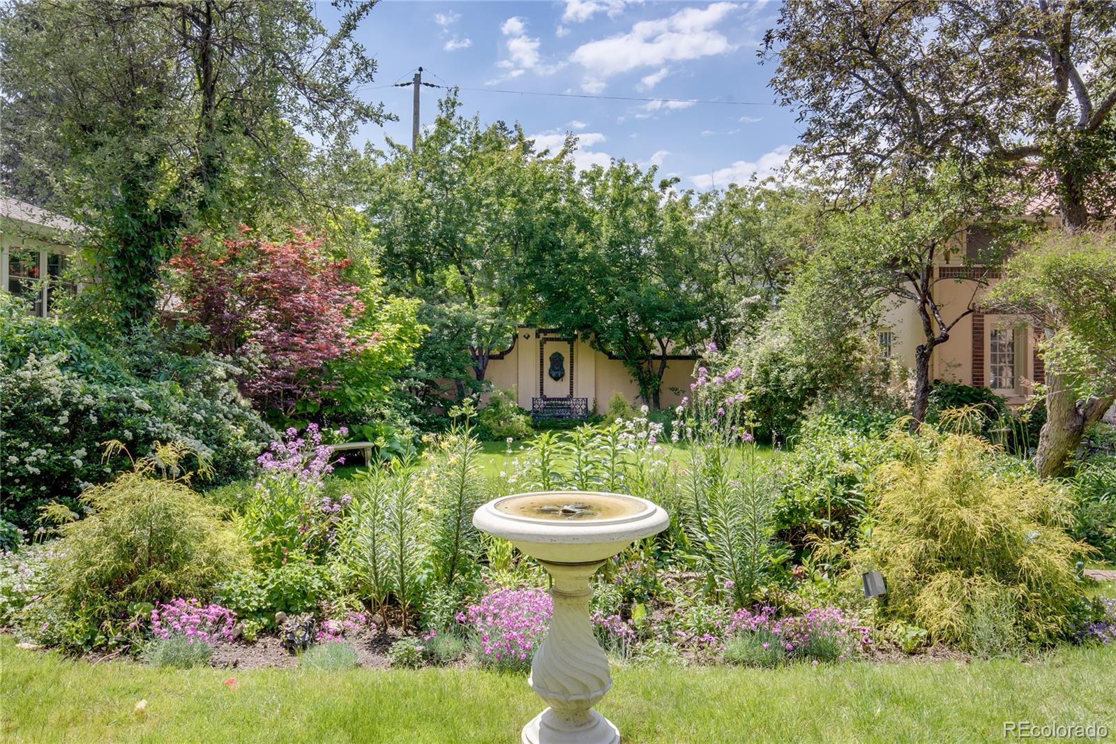 199 Lafayette Street Denver, CO 80218 - Photo 42 of 49 a view of a fountain in front of house