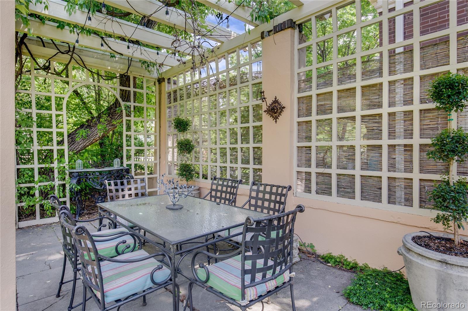 199 Lafayette Street Denver, CO 80218 - Photo 45 of 49 a table and chairs in front of a house