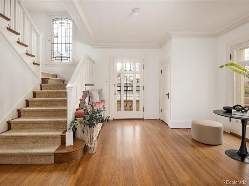 199 Lafayette Street Denver, CO 80218 - Photo 5 of 49 a view of entryway and hall with wooden floor