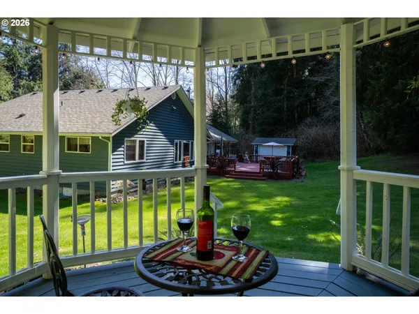 a view of a back yard of the house and a garden