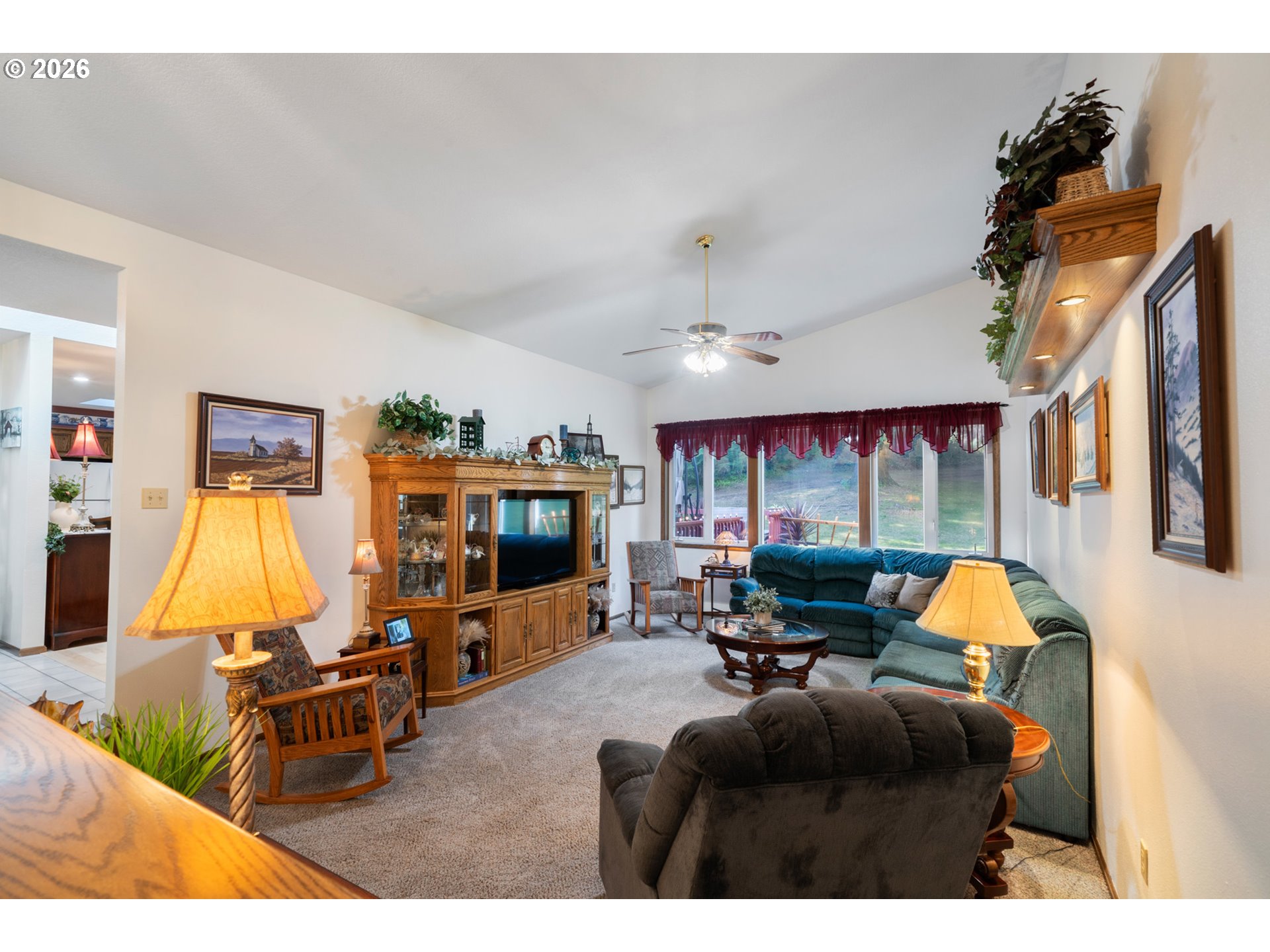 23100 Miami Foley Road Nehalem, OR 97131 - Photo 24 of 47 a living room with furniture flat screen tv and a fireplace