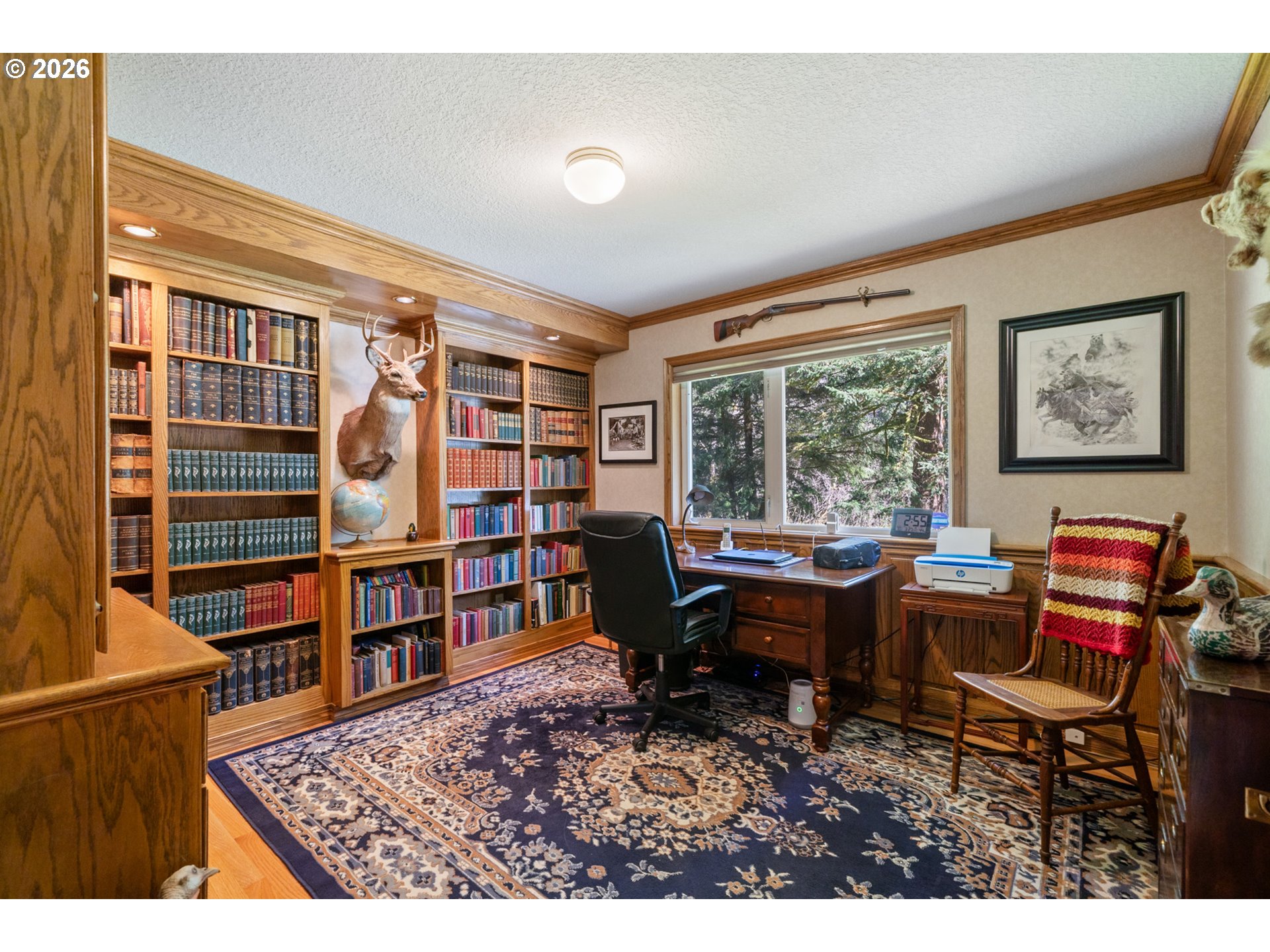23100 Miami Foley Road Nehalem, OR 97131 - Photo 27 of 47 a view of a workspace with furniture and a window