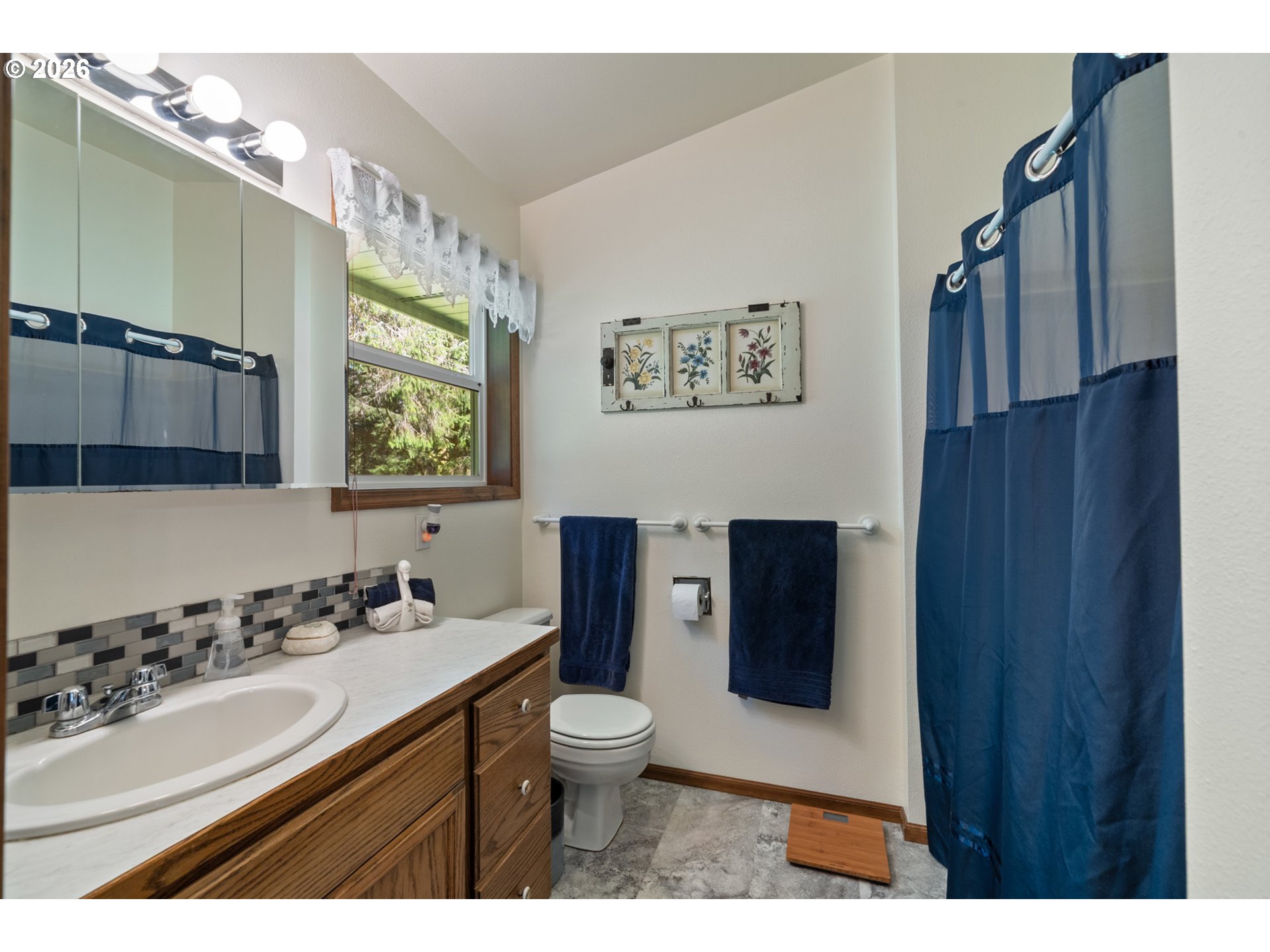 23100 Miami Foley Road Nehalem, OR 97131 - Photo 35 of 47 a bathroom with a sink toilet and mirror