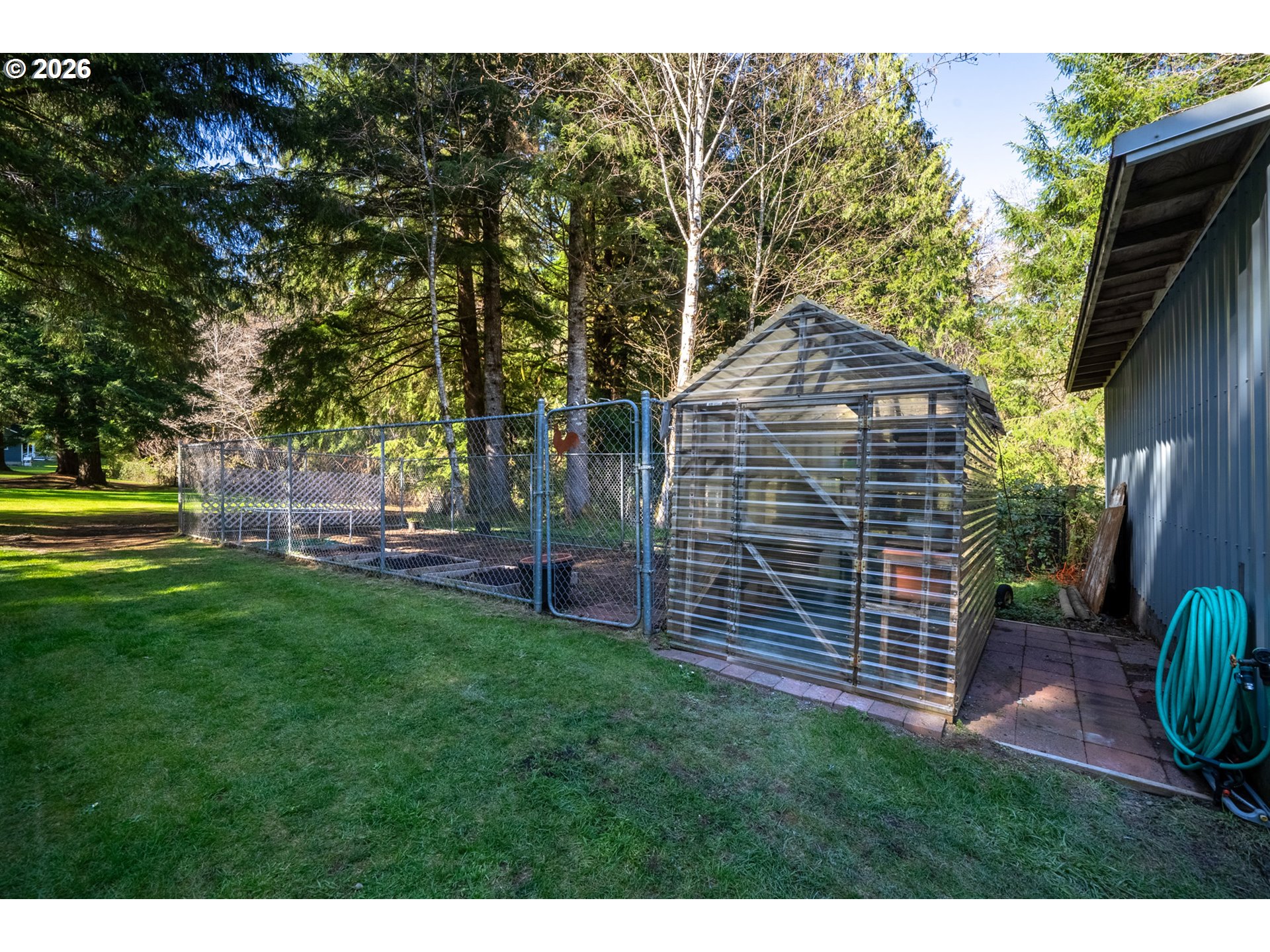 23100 Miami Foley Road Nehalem, OR 97131 - Photo 44 of 47 a front view of a house with garden
