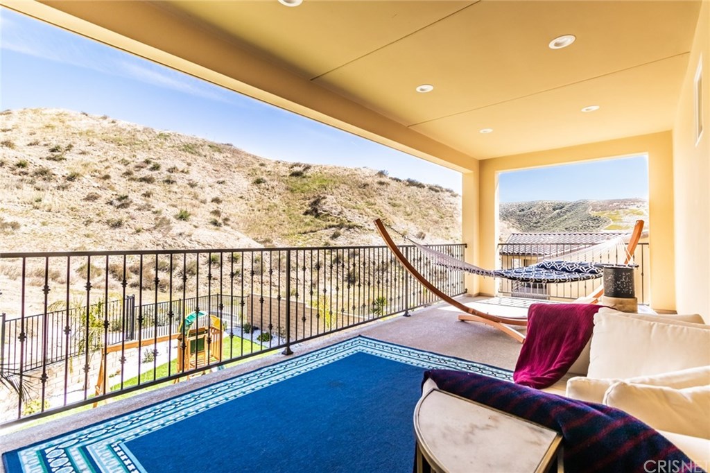 19047 Bension Drive Saugus, CA 91350 - Photo 36 of 72 large primary suite covered deck with hillside views